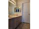 Bathroom featuring a double vanity with cabinets and drawers at 1838 N Jones Blvd, Las Vegas, NV 89108