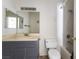Bathroom features vanity, mirror, toilet and shower with tub at 1838 N Jones Blvd, Las Vegas, NV 89108