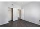 Bedroom featuring sliding door closet and hardwood floors at 1838 N Jones Blvd, Las Vegas, NV 89108