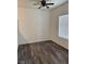 Clean, light-filled bedroom with modern flooring, ceiling fan, and natural light from a window at 1838 N Jones Blvd, Las Vegas, NV 89108