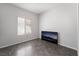 Bedroom featuring hardwood floors and a window at 1838 N Jones Blvd, Las Vegas, NV 89108