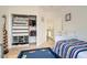 bedroom features a playful design, open closet system, and colorful accents creating a cheerful space at 1925 Grey Eagle St, Henderson, NV 89074