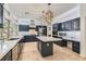 Beautifully designed kitchen featuring a central island, stainless steel appliances, and modern cabinetry at 1925 Grey Eagle St, Henderson, NV 89074