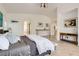 The main bedroom featuring Travertine floors, views into other rooms, and a modern design at 1925 Grey Eagle St, Henderson, NV 89074