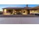 Spacious backyard patio with outdoor kitchen, lounge area, and hot tub provides desert living appeal at 2051 Saginaw Ave, Pahrump, NV 89048