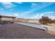 The backyard has a large patio, hot tub, and mountain views at 2051 Saginaw Ave, Pahrump, NV 89048