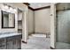 Bathroom with soaking tub, step-in shower, and granite countertops at 2051 Saginaw Ave, Pahrump, NV 89048