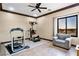 Workout room features exercise equipment, a comfortable chair, and a window with a scenic view at 2051 Saginaw Ave, Pahrump, NV 89048