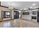 Open floor plan with stylish kitchen and outside views through windows at 2051 Saginaw Ave, Pahrump, NV 89048