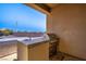 This outdoor kitchen features a stainless-steel grill and sink at 2051 Saginaw Ave, Pahrump, NV 89048