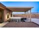 Relax outside on this covered patio with a hot tub and mountain views at 2051 Saginaw Ave, Pahrump, NV 89048