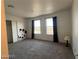Spacious bedroom has natural light, closet, and neutral carpet that make it cozy at 2064 Mesquite Ln # 304, Laughlin, NV 89029