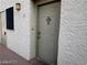 Condo front door with a cross on the door at 2064 Mesquite Ln # 304, Laughlin, NV 89029