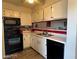 Galley kitchen that has white cabinets and modern appliances at 2064 Mesquite Ln # 304, Laughlin, NV 89029