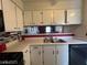 Efficient kitchen with a stainless steel sink and mirror backsplash at 2064 Mesquite Ln # 304, Laughlin, NV 89029