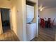This laundry area features a stackable washer and dryer, with adjacent rooms at 2064 Mesquite Ln # 304, Laughlin, NV 89029