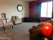This living room features a cozy sofa, carpet floors, and modern decor at 2064 Mesquite Ln # 304, Laughlin, NV 89029