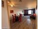 Open floor plan with dining table, living area, and bright window at 2064 Mesquite Ln # 304, Laughlin, NV 89029