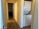 Stacked washer and dryer in the hallway offer convenience at 2064 Mesquite Ln # 304, Laughlin, NV 89029