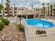 Beautiful resort-style pool surrounded by lush landscaping and desert accents at 2064 Mesquite Ln # 304, Laughlin, NV 89029