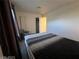 Bedroom with a Queen bed, chair, and neutral carpet that make it cozy at 2064 Mesquite Ln # 304, Laughlin, NV 89029
