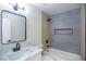 Modern renovated bathroom with updated tub, shower, vanity and matte black fixtures at 208 N Bruce St # A, Las Vegas, NV 89101