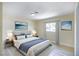 Digitally staged bedroom with a large bed, side tables, and blue accents at 208 N Bruce St # A, Las Vegas, NV 89101