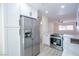 A kitchen featuring stainless steel appliances, white cabinets and countertops at 208 N Bruce St # A, Las Vegas, NV 89101