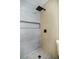 Modern tiled shower featuring a niche, rain shower head, and matte black fixtures at 208 N Bruce St # A, Las Vegas, NV 89101