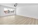 The bedroom features light, neutral paint, modern flooring, and large window at 2105 Berkley Ave, Las Vegas, NV 89101