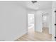 A clean and bright hallway leads to bedrooms, accentuated with stylish wood-look tile flooring at 2105 Berkley Ave, Las Vegas, NV 89101