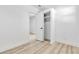 Bright hallway with modern flooring, connecting several rooms, and a closet at 2105 Berkley Ave, Las Vegas, NV 89101