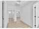 Well-lit hallway featuring sleek floors and multiple doorways, creating an open flow at 2105 Berkley Ave, Las Vegas, NV 89101