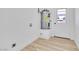 Conveniently located laundry room with modern flooring and access to the backyard at 2105 Berkley Ave, Las Vegas, NV 89101