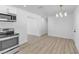 Modern kitchen featuring stainless steel appliances opens to the bright living room area at 2105 Berkley Ave, Las Vegas, NV 89101