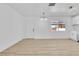 Spacious living room with modern flooring has a ceiling fan and recessed lighting at 2105 Berkley Ave, Las Vegas, NV 89101