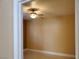 Bright and airy bedroom featuring neutral walls and a ceiling fan for added comfort at 2153 Jade Creek St # 106, Las Vegas, NV 89117