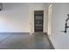 Spacious garage with shelving in the storage area is ready for your vehicles and hobbies at 2153 Jade Creek St # 106, Las Vegas, NV 89117