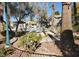Community pool with mature landscaping is ready for lounging and staying cool in the sun at 2153 Jade Creek St # 106, Las Vegas, NV 89117