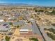 Spacious single-story home with desert landscaping, long drive, and panoramic mountain views in a quiet neighborhood at 230 S Weeping Willow Ct, Pahrump, NV 89048