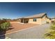 Backyard with covered patio area, providing an outdoor living space at 230 S Weeping Willow Ct, Pahrump, NV 89048