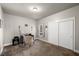 Neutral bedroom with desk, chair, closet, window, and soft carpeting at 230 S Weeping Willow Ct, Pahrump, NV 89048