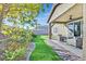 Lush backyard featuring well-manicured lawn and beautiful landscaping offers a serene outdoor retreat at 2383 Elmont Ave, North Las Vegas, NV 89086