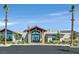 Upscale community clubhouse with modern architectural details, desert landscaping and inviting entrance at 2383 Elmont Ave, North Las Vegas, NV 89086