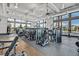Resident gym with weight machines, fans, and large windows overlooking the community at 2383 Elmont Ave, North Las Vegas, NV 89086