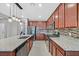 Well-equipped kitchen with granite countertops, stainless steel appliances, and ample cabinet space at 2383 Elmont Ave, North Las Vegas, NV 89086