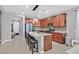 Modern kitchen featuring granite countertops, stainless steel appliances, and center island at 2383 Elmont Ave, North Las Vegas, NV 89086