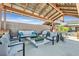 Outdoor patio with modern seating and tables for residents to enjoy at 2383 Elmont Ave, North Las Vegas, NV 89086