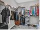 Organized walk-in closet with ample storage space for clothes, shoes, and accessories at 2383 Elmont Ave, North Las Vegas, NV 89086
