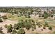 An aerial view of a golf course and the surrounding neighborhood at 2425 Greens Ave, Henderson, NV 89014